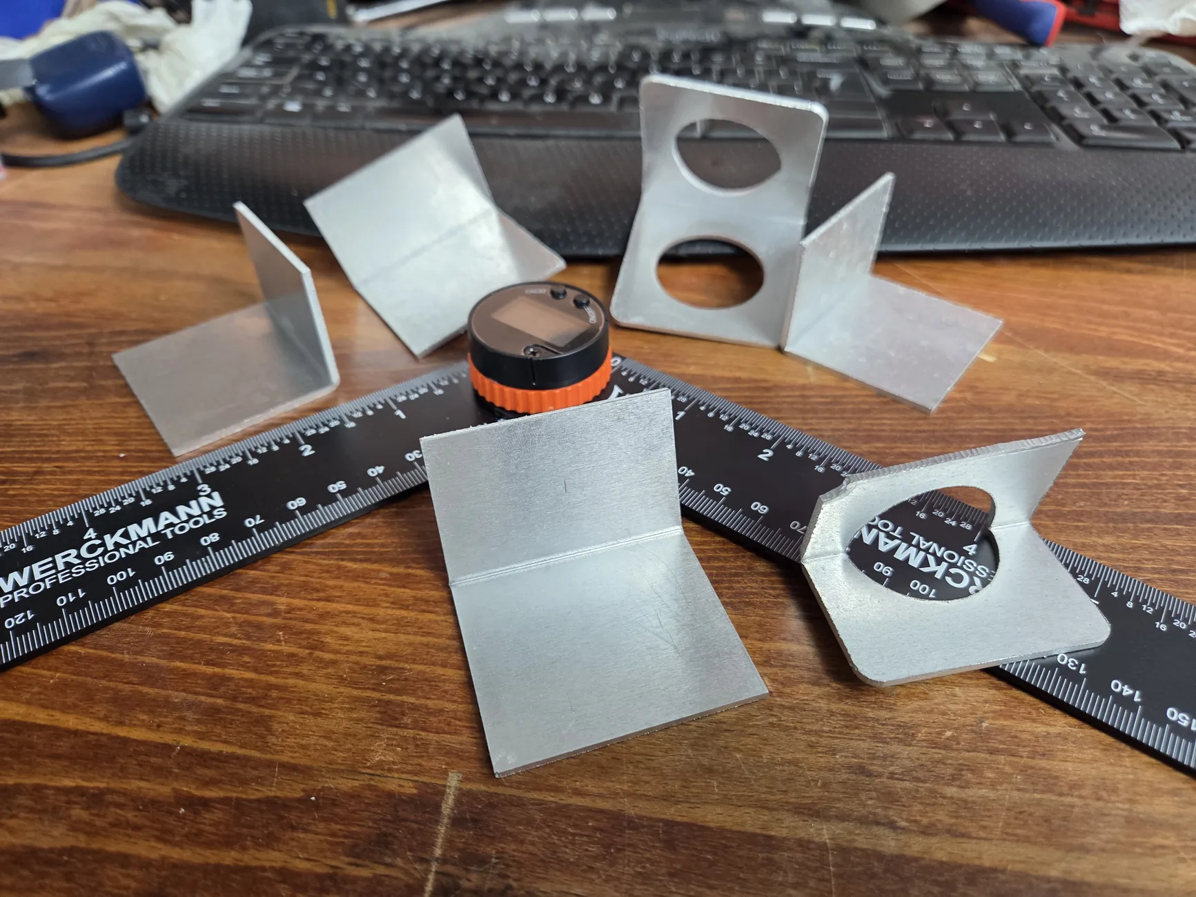 Finished laser-cut and welded metal parts made in The Yield Point workshop
